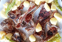 Chiringuito Casa Nostra - Chuletas cordero patatas- Adra kmcero